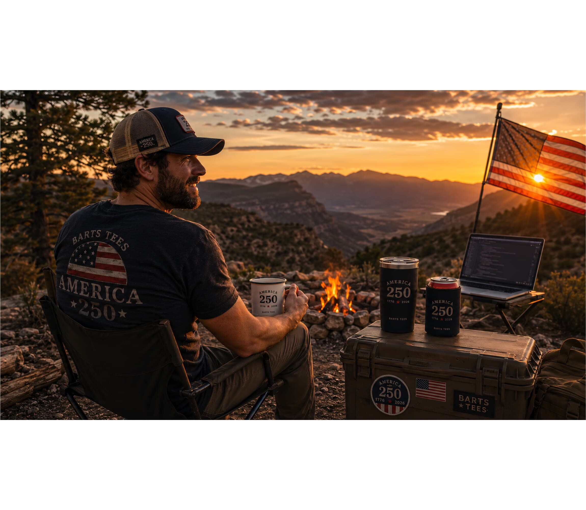 America 250 — operator in a Bart's Tees flag tee overlooking a mountain sunset with a laptop and campfire